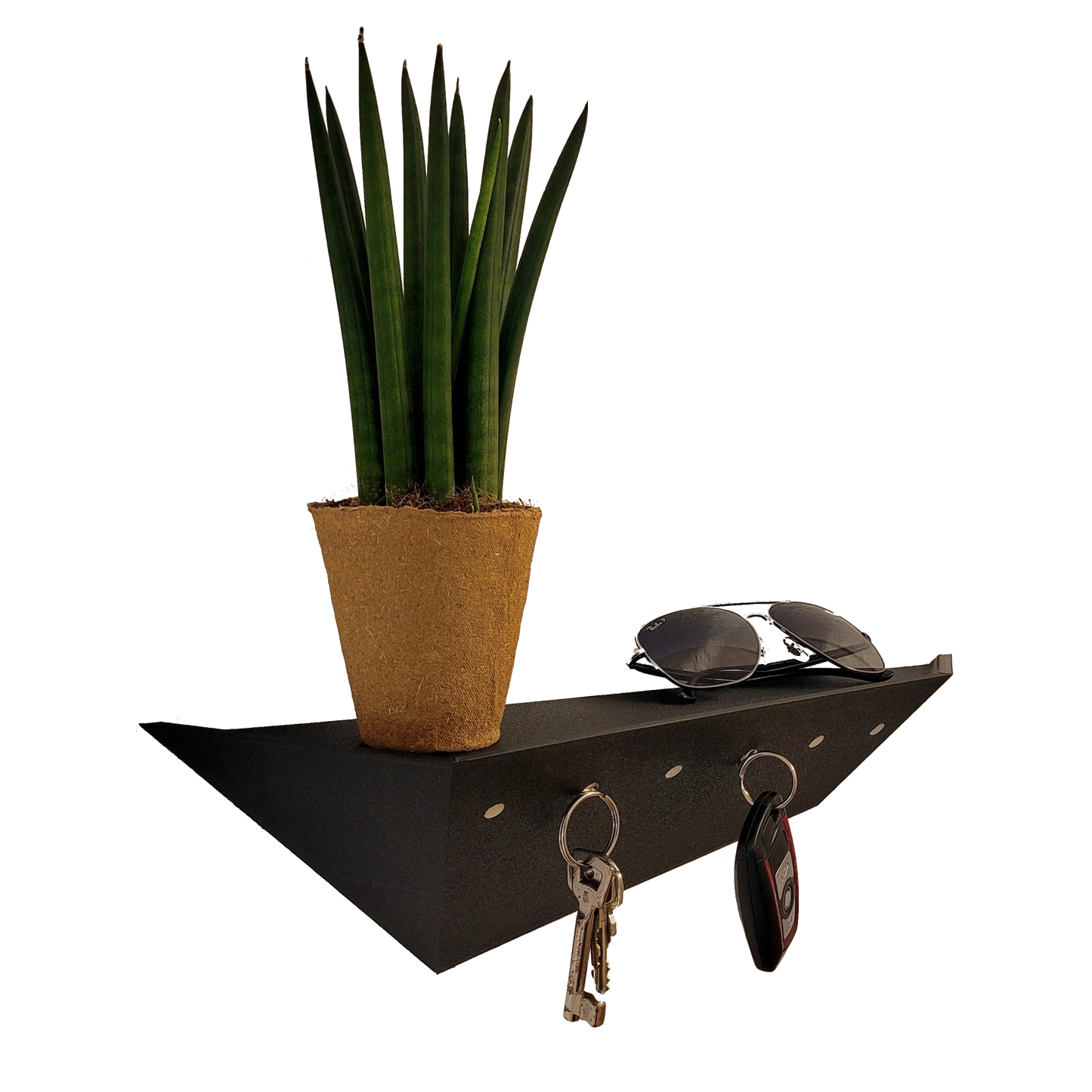 Treeboard Designer Schlüsselbrett in Schwarz – Seitenansicht links mit Schlüsselbund, Brille und Dekoblume, funktionale magnetische Halterung, modernes Wandaccessoire für Flur und Büro, hochwertiges Interior Foto, Made in Germany.